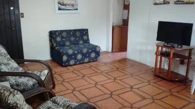 A planta de Apartamento Aconchegante
