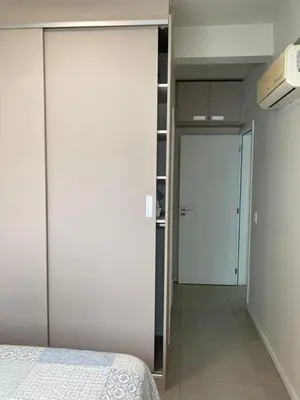 Uma cama ou camas num quarto em Praia de Palmas Ville