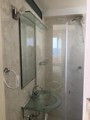 Uma casa de banho em Apartamento frente ao mar