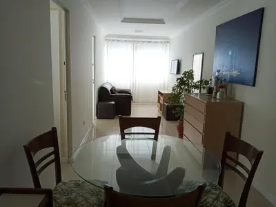 Uma área de estar em Apartamento frente ao mar