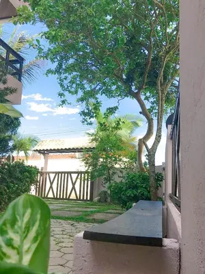 Um jardim no exterior de Residencial Solar das Flores apto 07