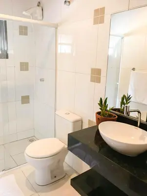 Uma casa de banho em Residencial Solar das Flores apto 07