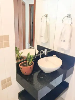 Uma casa de banho em Residencial Solar das Flores apto 07
