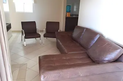 Uma área de estar em Apartamento com Vista para o Mar, Residencial Vista Bella