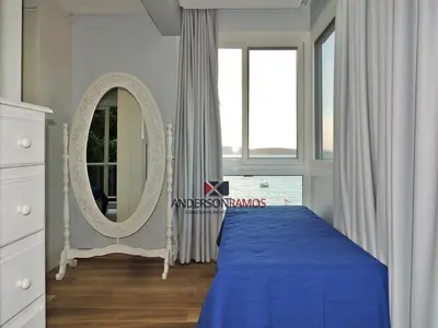 Uma cama ou camas num quarto em 1080 - Apartamento com vista para o mar em Bombinhas