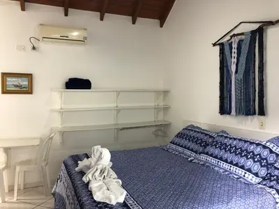 Uma cama ou camas num quarto em Pousada Canario Azul