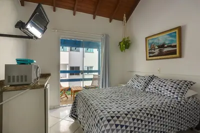 Uma cama ou camas num quarto em Pousada Canario Azul