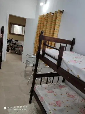 Uma cama ou camas num quarto em Casa de Família