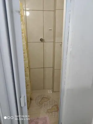 Uma casa de banho em Casa de Família