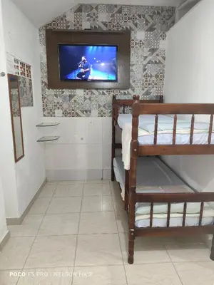 Uma cama ou camas num quarto em Casa de Família