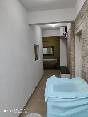 Uma cama ou camas num quarto em Casa de Família
