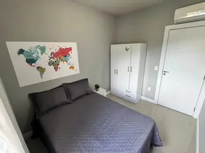 Uma cama ou camas num quarto em 150m da Praia Pereque, 3 quartos, Amplo e Aconchegante