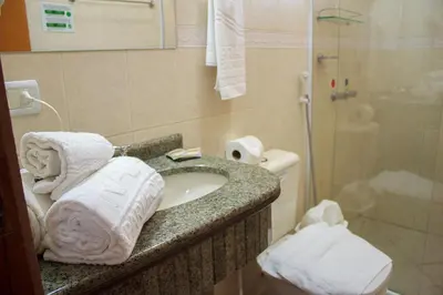 Uma casa de banho em Bombinhas Praia Apart Hotel - unidade rua Bem Te Vi