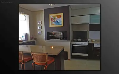 A cozinha ou kitchenette de Cobertura Praia de Palmas