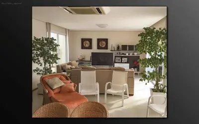 Uma televisão e/ou sistema de entretenimento em Cobertura Praia de Palmas
