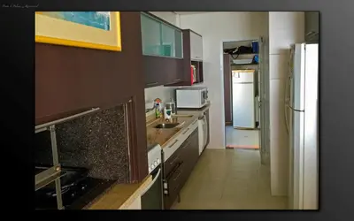 A cozinha ou kitchenette de Cobertura Praia de Palmas