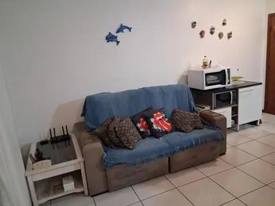 Uma área de estar em Apartamento em Meia Praia, Itapema, SC.