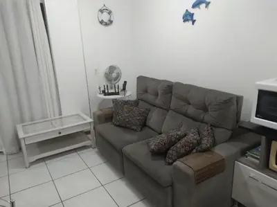 Uma área de estar em Apartamento em Meia Praia, Itapema, SC.