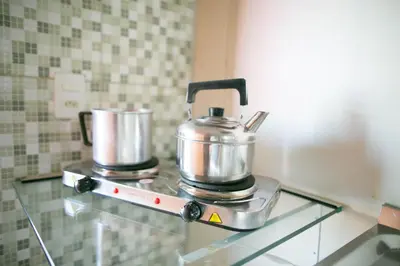 A cozinha ou kitchenette de Casa Olinda Estúdios e Suítes com Piscina e Churrasqueira qq