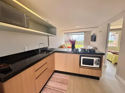 A cozinha ou kitchenette de Apartamentos Frente ao Mar