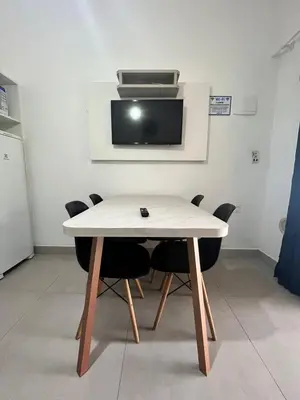 Uma televisão e/ou sistema de entretenimento em RESIDENCIAL FLAMINI