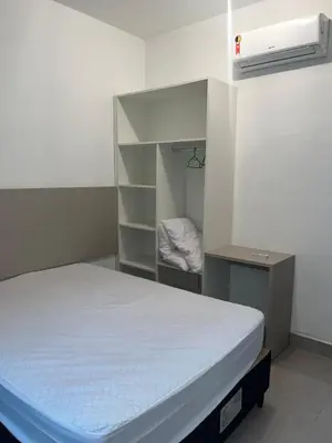 Uma cama ou camas num quarto em RESIDENCIAL FLAMINI