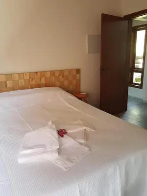 Uma cama ou camas num quarto em Vila Figueiredo das Donas