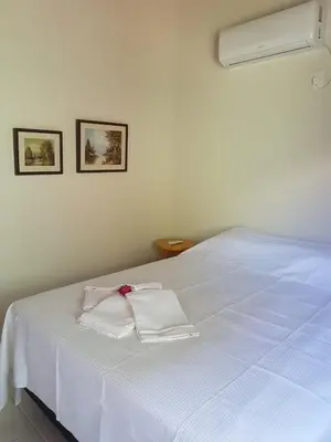 Uma cama ou camas num quarto em Vila Figueiredo das Donas