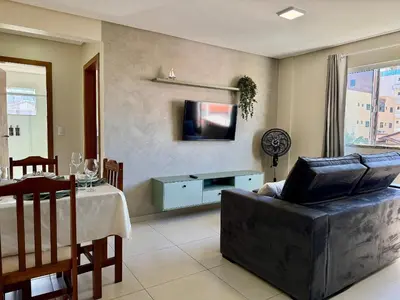 Uma televisão e/ou sistema de entretenimento em Residencial 287 - Localização privilegiada à 5min da praia