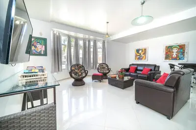 Uma área de estar em Casa de Praia em Bombinhas Beach House