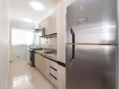 A cozinha ou kitchenette de Apartamento com suíte para 6 pessoas – Bombas