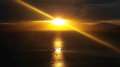 O nascer ou o pôr do sol visto a partir do aparthotel