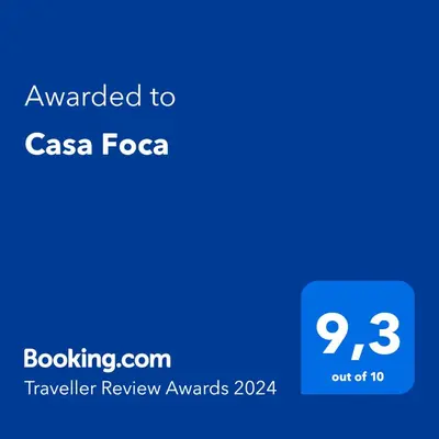 Um certificado, prémio, placa ou documento mostrado em Casa Foca