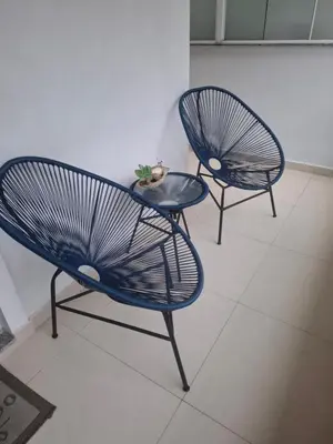 Uma área de estar em Apartamentos próximo à praia