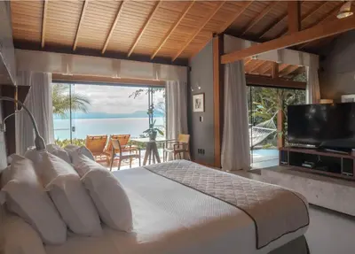 Uma cama ou camas num quarto em Awasi Santa Catarina