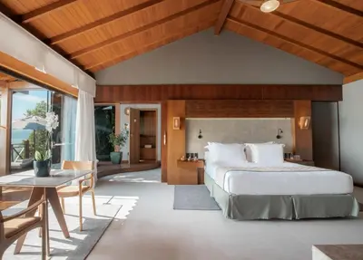 Uma cama ou camas num quarto em Awasi Santa Catarina