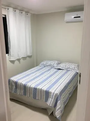 Uma cama ou camas num quarto em Apartamento Mariscal