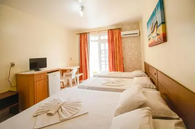 Uma cama ou camas num quarto em Pousada Lugar ao Sol