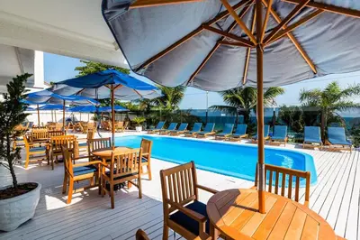 A piscina em ou perto de Bombinhas Blue Suítes