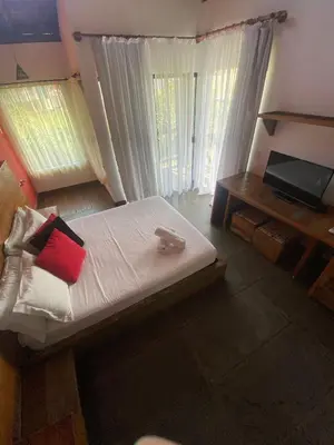 Uma cama ou camas num quarto em Villa Aragua