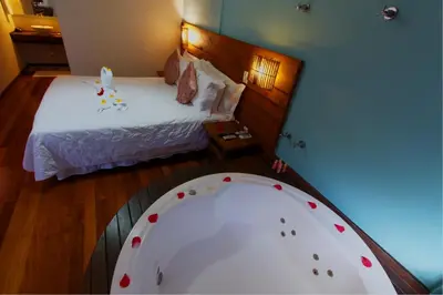 Uma cama ou camas num quarto em Pousada Vila Boa Vida