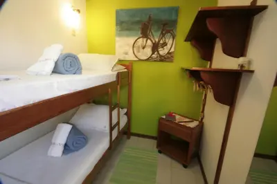 Uma cama ou camas num quarto em Pousada Vila Boa Vida