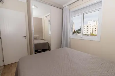 Uma cama ou camas num quarto em 006 - Amplo 3 quartos com vista mar em Bombas