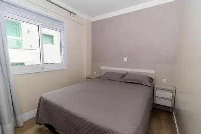 Uma cama ou camas num quarto em 006 - Amplo 3 quartos com vista mar em Bombas