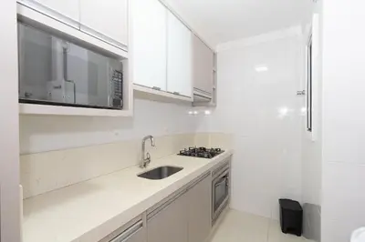 A cozinha ou kitchenette de 006 - Amplo 3 quartos com vista mar em Bombas