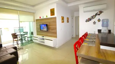 Uma televisão e/ou sistema de entretenimento em 1043 Apartamento a 50 mts da Praia de Bombinhas