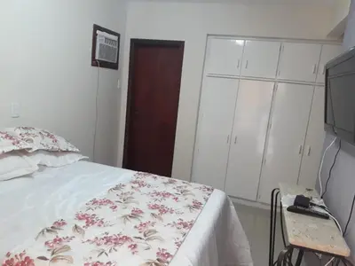 Uma cama ou camas num quarto em Ap rua 255 Meia Praia Itapema 10 metros Mar