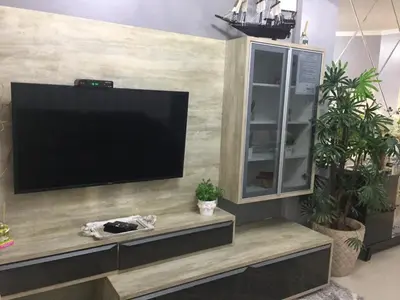 Uma televisão e/ou sistema de entretenimento em Ap rua 255 Meia Praia Itapema 10 metros Mar