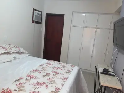 Uma cama ou camas num quarto em Ap rua 255 Meia Praia Itapema 10 metros Mar
