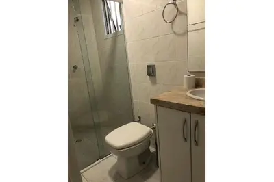 Uma casa de banho em Apto Almeida e Moraes Frente Mar Meia Praia